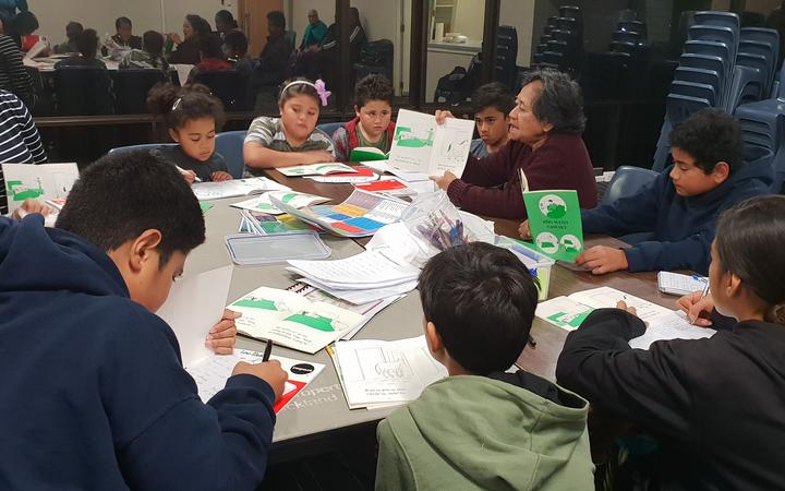 Children learning from storybook